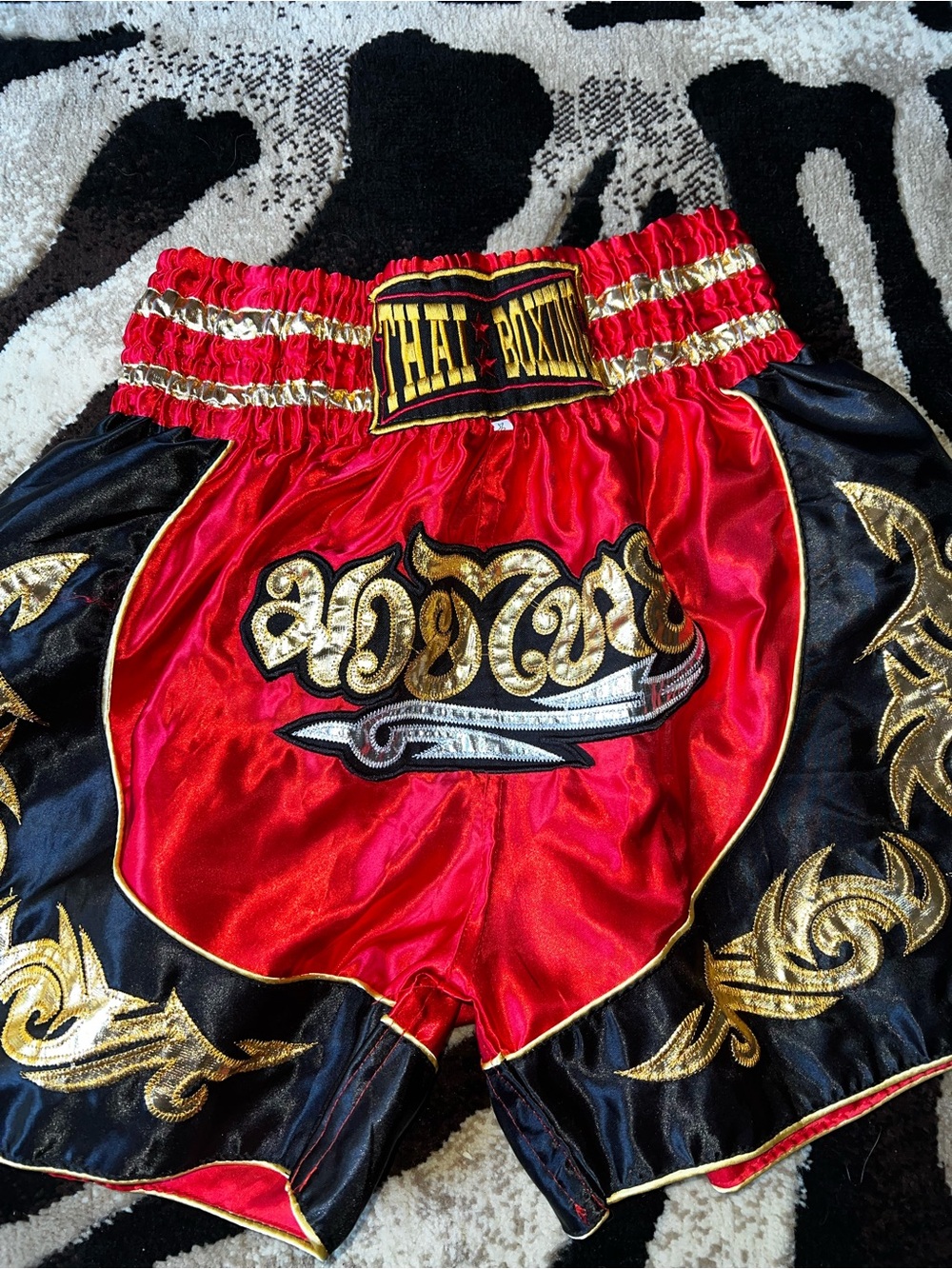 Thai Boxing Satin Shorts in Red & Black with Gold Detailing